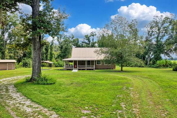 11.3 Acres of Land with Home for Sale in Pinetta, Florida
