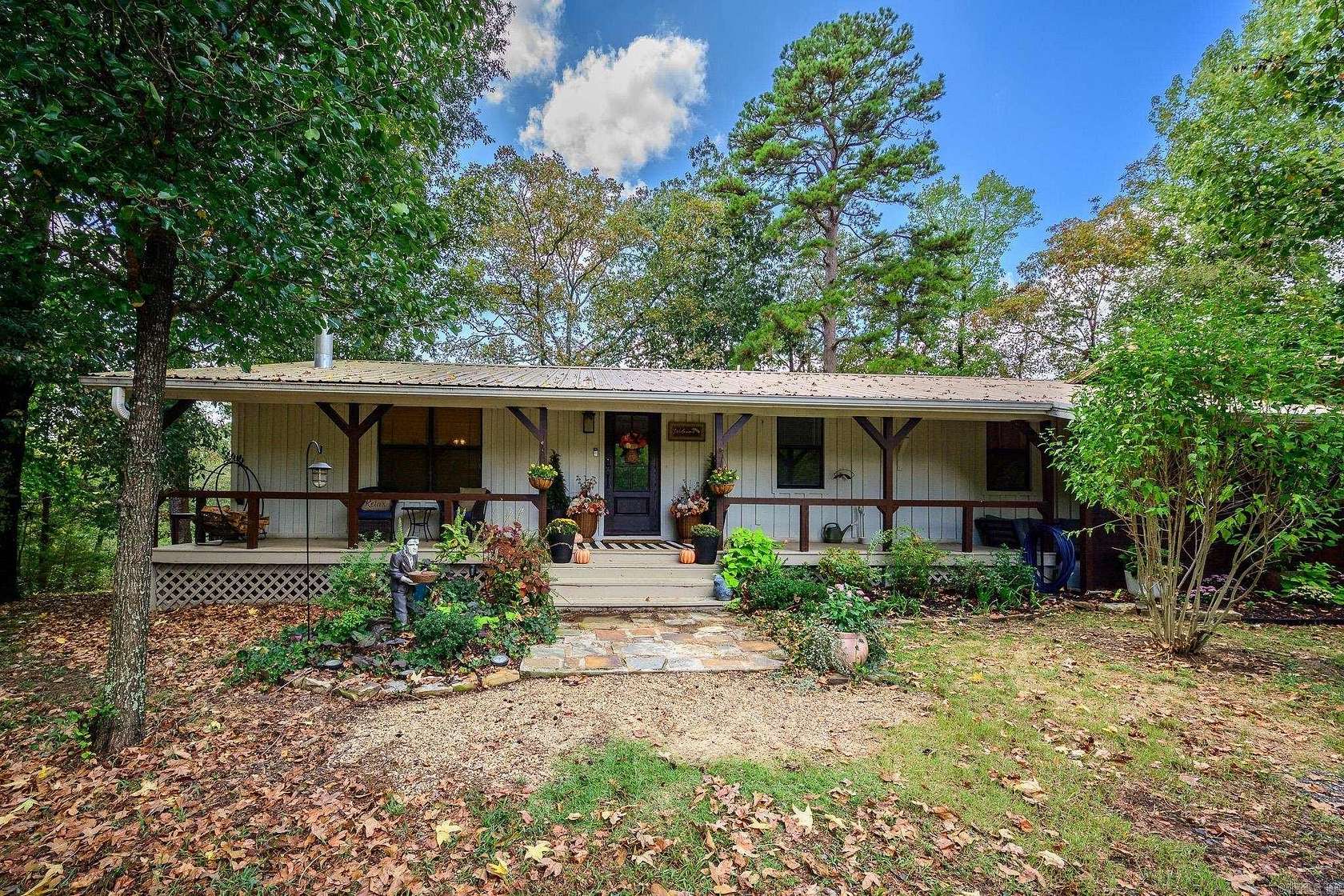 9.46 Acres of Land with Home for Sale in Mena, Arkansas