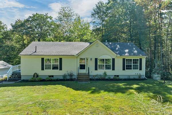 4.4 Acres of Land with Home for Sale in New Durham, New Hampshire