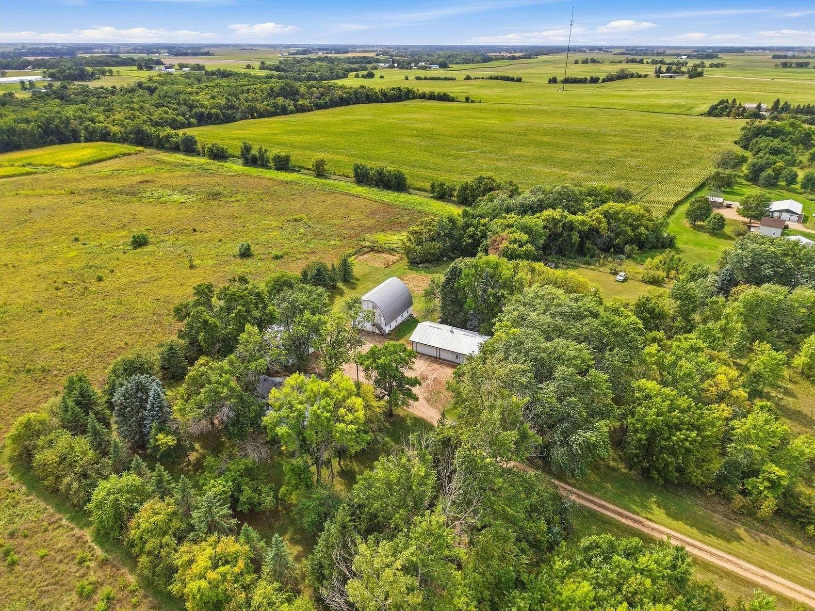 58 Acres of Land with Home for Sale in Lester Prairie, Minnesota
