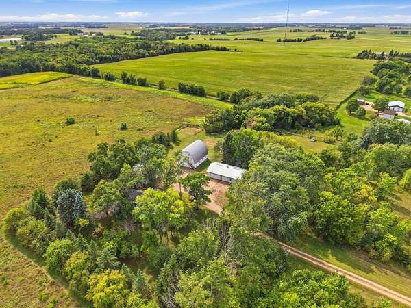 58 Acres of Land with Home for Sale in Lester Prairie, Minnesota
