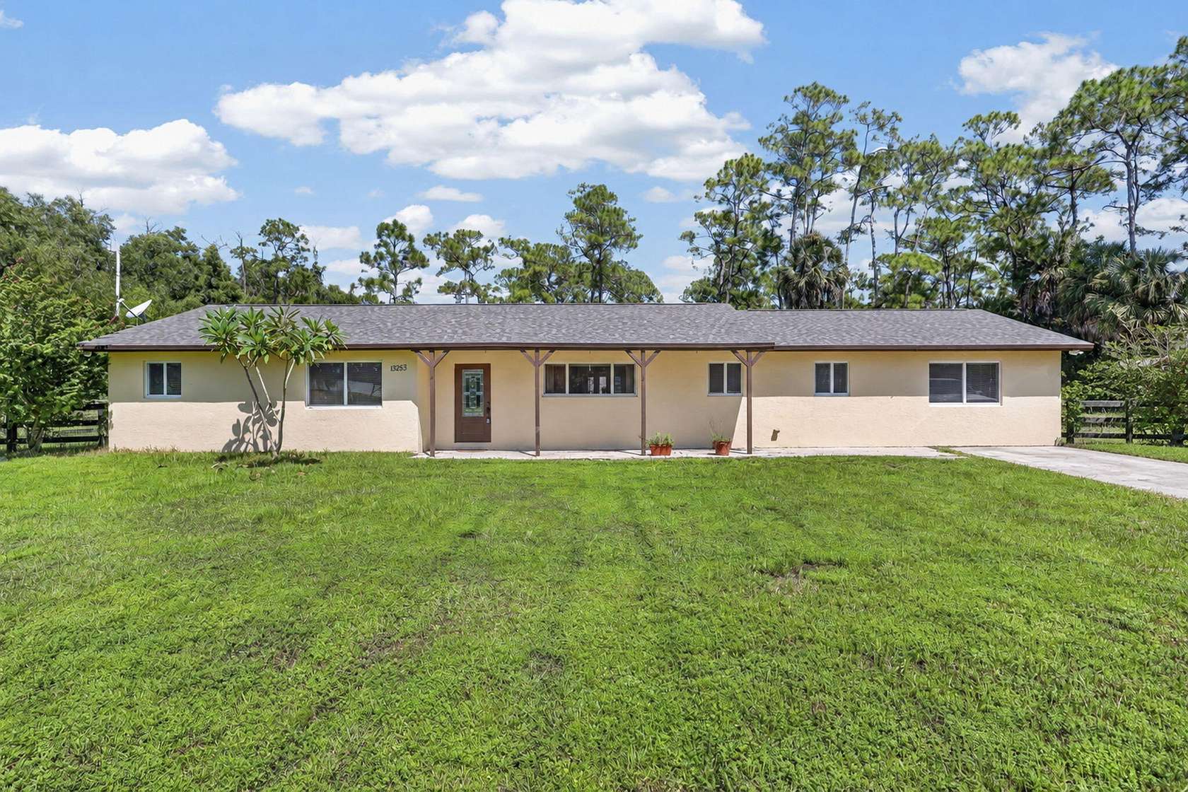 2.5 Acres of Land with Home for Sale in Loxahatchee Groves, Florida
