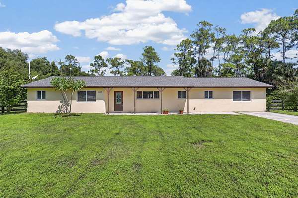2.5 Acres of Land with Home for Sale in Loxahatchee Groves, Florida