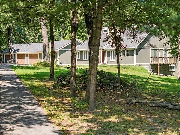 9.66 Acres of Land with Home for Sale in Grain Valley, Missouri