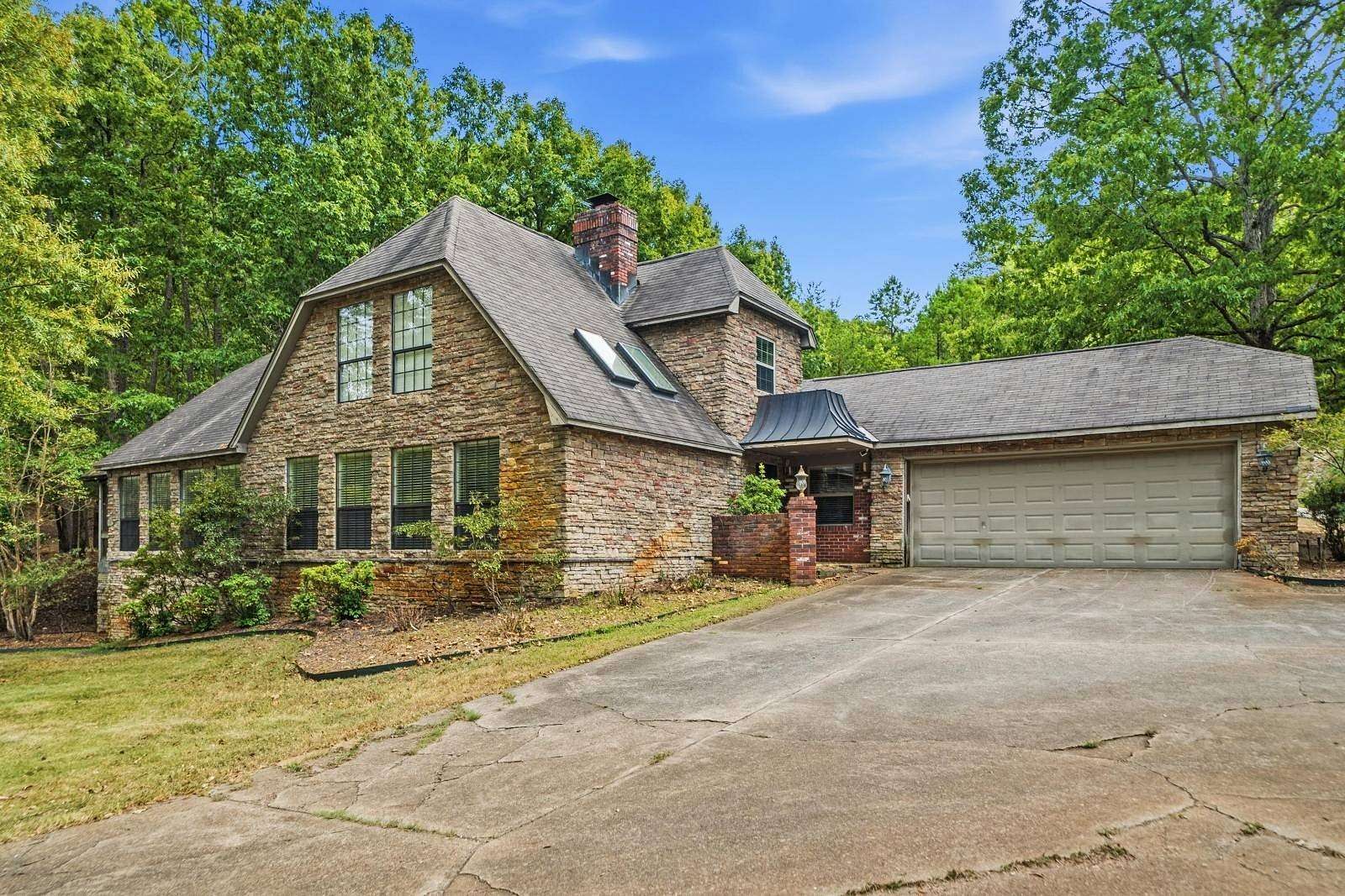 10.8 Acres of Recreational Land with Home for Auction in Little Rock, Arkansas