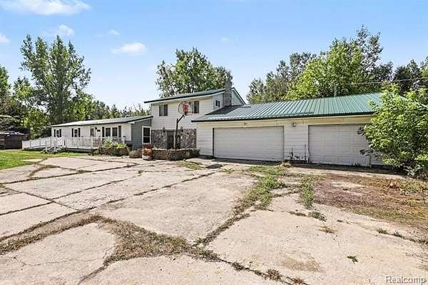 2.1 Acres of Land with Home for Sale in Dayton Township, Michigan