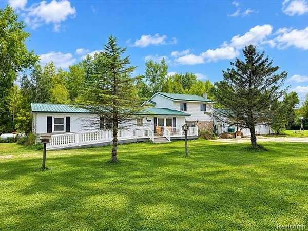 2.1 Acres of Land with Home for Sale in Dayton Township, Michigan
