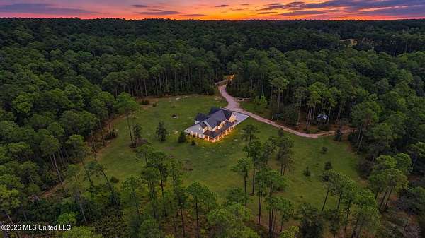 14.5 Acres of Land with Home for Sale in Kiln, Mississippi