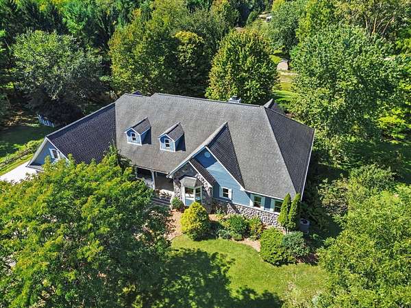 2.5 Acres of Land with Home for Sale in Whitmore Lake, Michigan