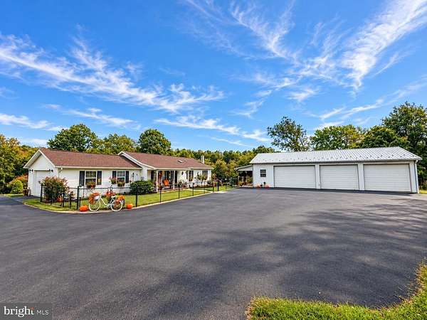 1.65 Acres of Land with Home for Sale in Berkeley Springs, West Virginia