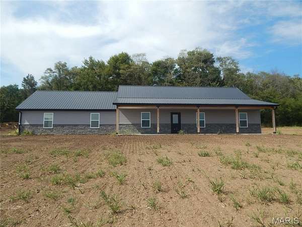 3.13 Acres of Land with Home for Sale in New London, Missouri