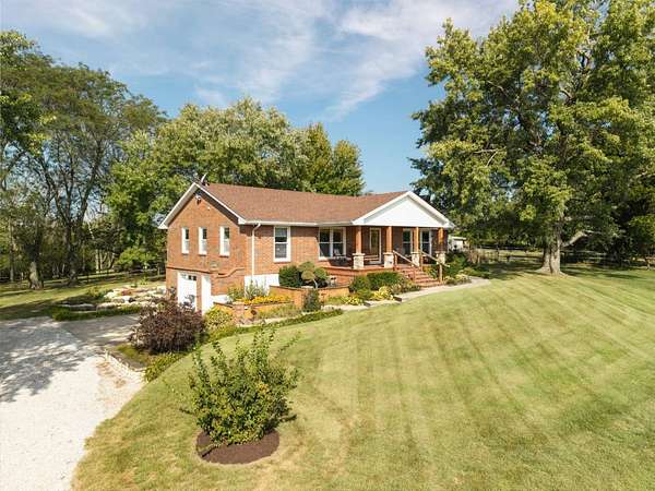 8.5 Acres of Land with Home for Sale in Lone Jack, Missouri