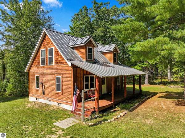 10 Acres of Recreational Land with Home for Sale in Manton, Michigan