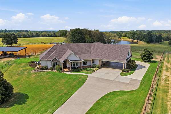 115 Acres of Agricultural Land with Home for Sale in Romance, Arkansas