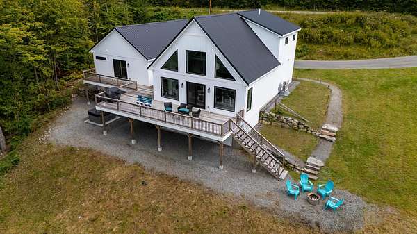 6.66 Acres of Land with Home for Sale in Sugar Hill, New Hampshire