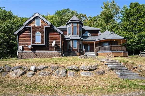 14.2 Acres of Land with Home for Sale in Bolton, Vermont