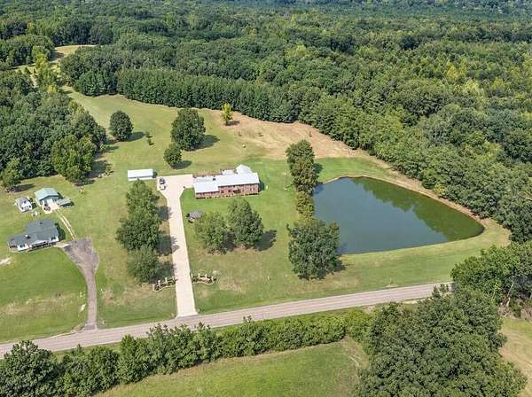140 Acres of Recreational Land with Home for Sale in Sardis, Mississippi
