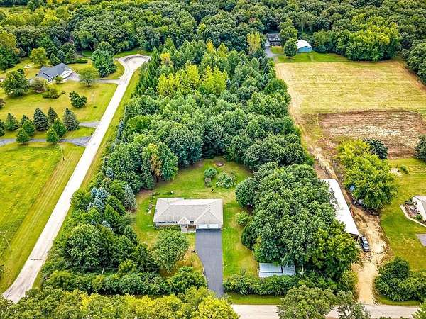 5 Acres of Land with Home for Sale in Monroe Center, Illinois