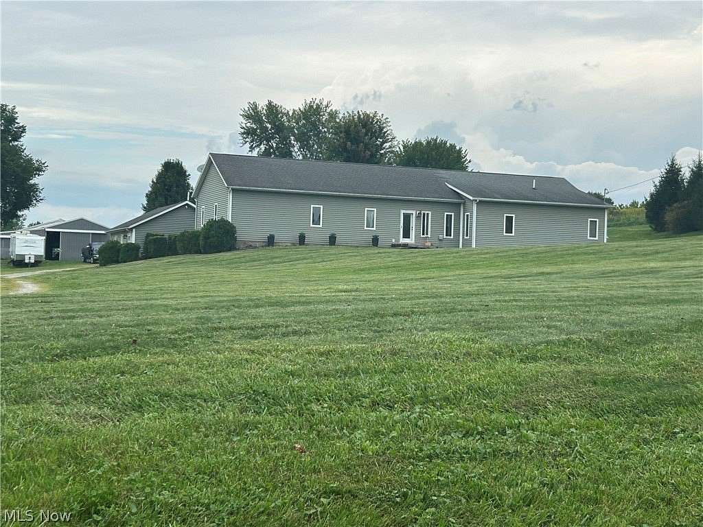 14 Acres of Land with Home for Sale in Adamsville, Ohio