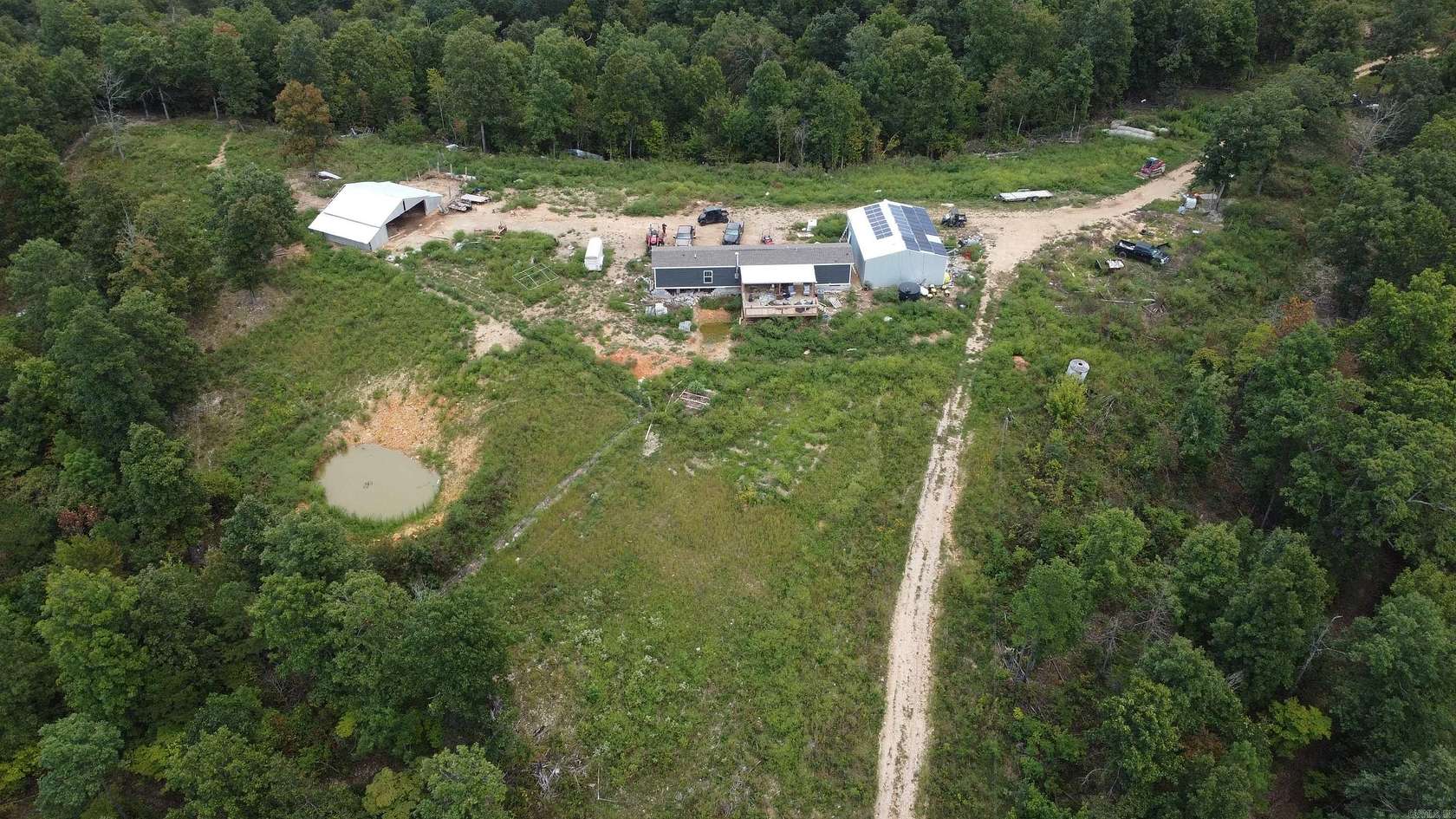 242 Acres of Land with Home for Sale in Harriet, Arkansas