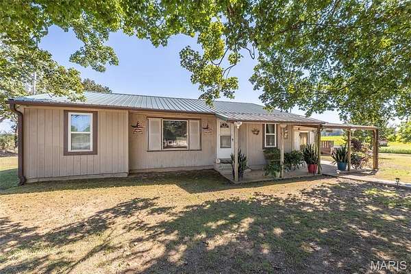37 Acres of Agricultural Land with Home for Sale in Doniphan, Missouri