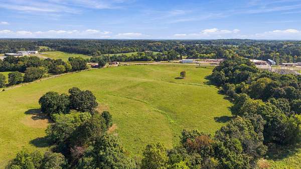 24.7 Acres of Commercial Land for Sale in Bon Aqua, Tennessee