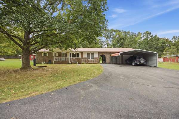 10.1 Acres of Land with Home for Sale in Dunlap, Tennessee
