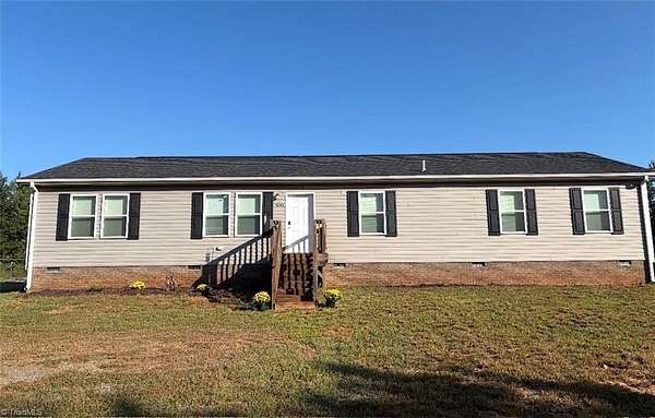 6.4 Acres of Land with Home for Sale in Walnut Cove, North Carolina