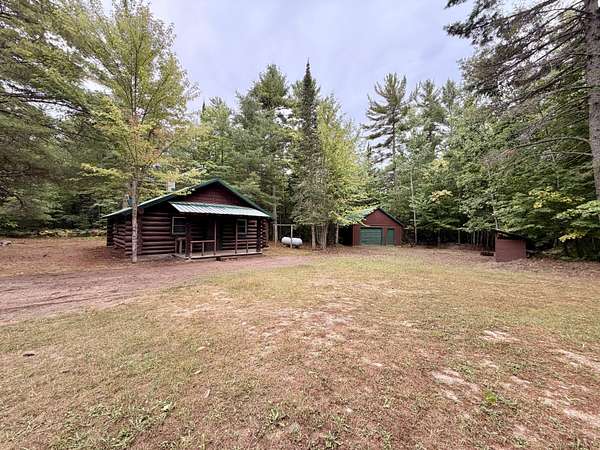 10 Acres of Recreational Land with Home for Sale in McMillan, Michigan