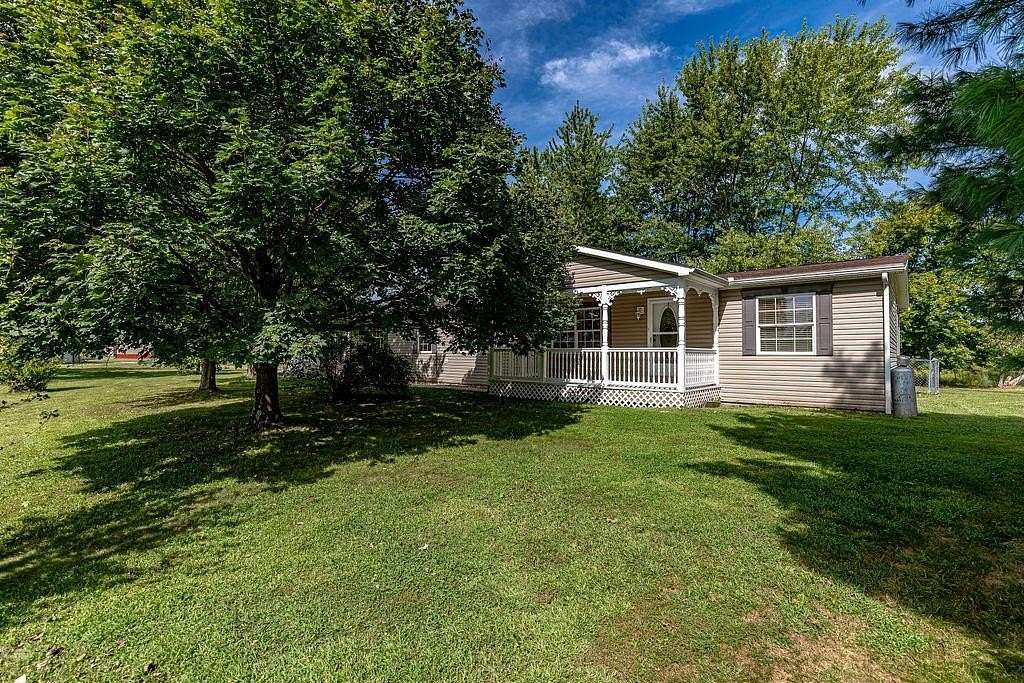 5.8 Acres of Land with Home for Sale in Sunman, Indiana