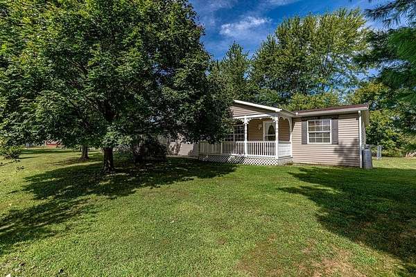 5.8 Acres of Land with Home for Sale in Sunman, Indiana