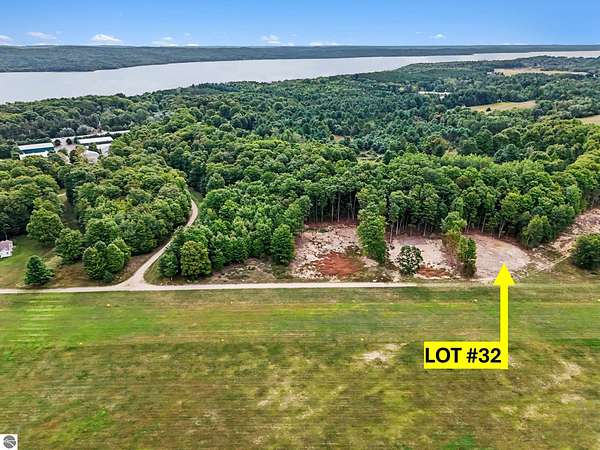 0.83 Acres of Residential Land for Sale in Kewadin, Michigan