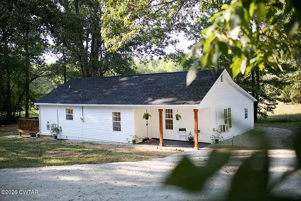 2 Acres of Land with Home for Sale in Beech Bluff, Tennessee
