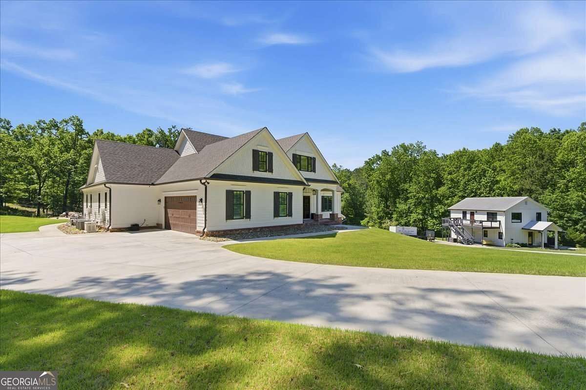10.4 Acres of Recreational Land with Home for Sale in Canton, Georgia