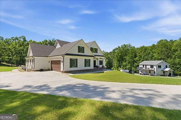 10.4 Acres of Recreational Land with Home for Sale in Canton, Georgia