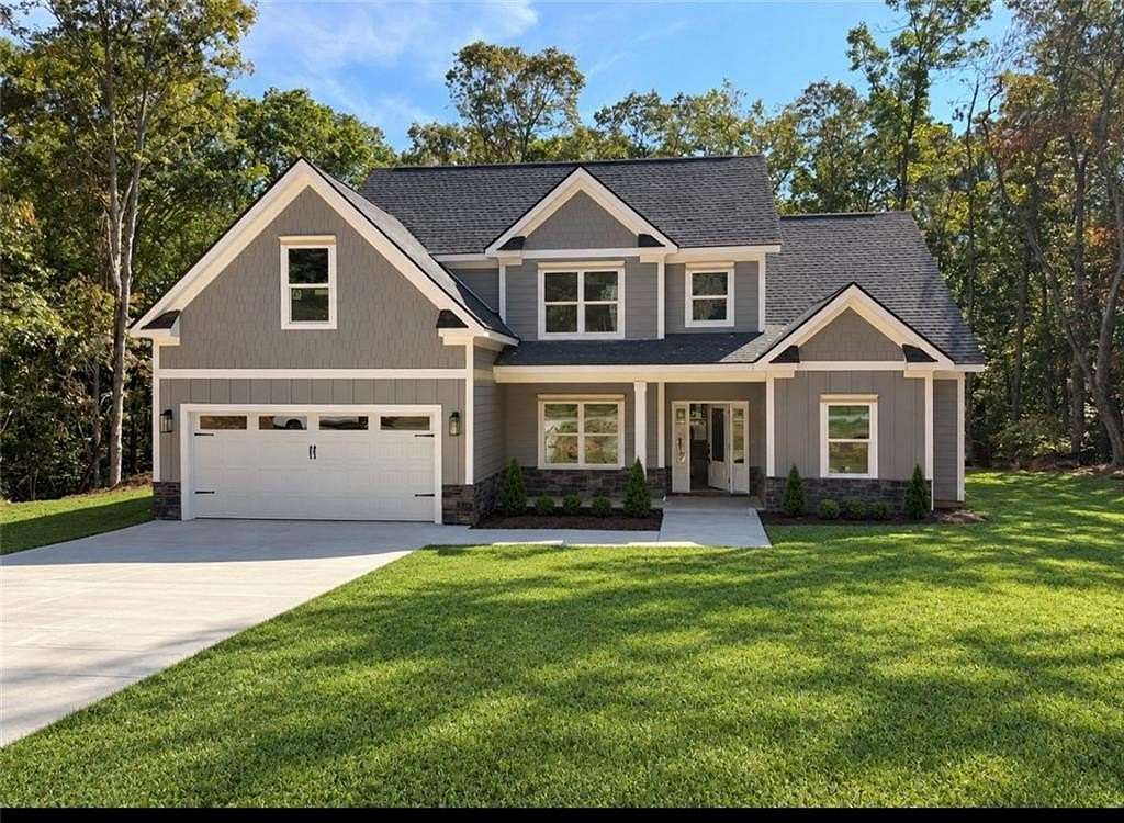 1.56 Acres of Land with Home for Sale in White, Georgia