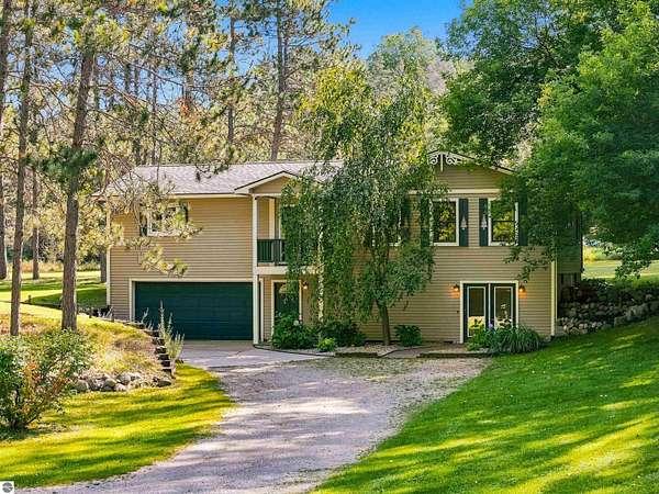 4 Acres of Land with Home for Sale in Williamsburg, Michigan