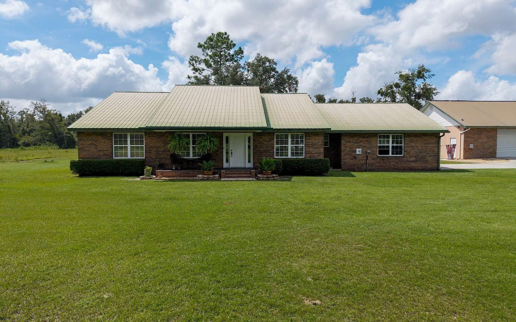 18.4 Acres of Land with Home for Sale in McAlpin, Florida