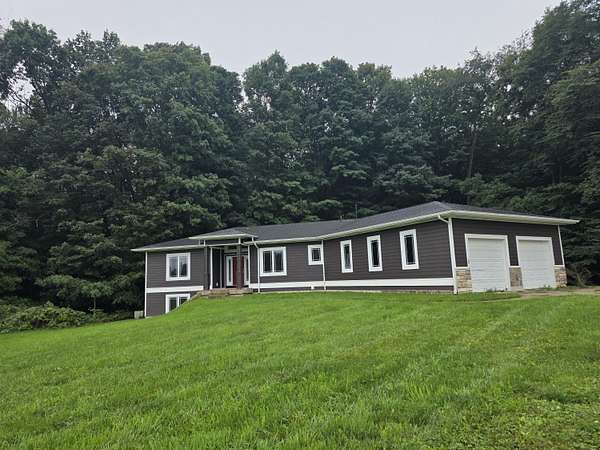 15 Acres of Land with Home for Sale in Grant, Michigan