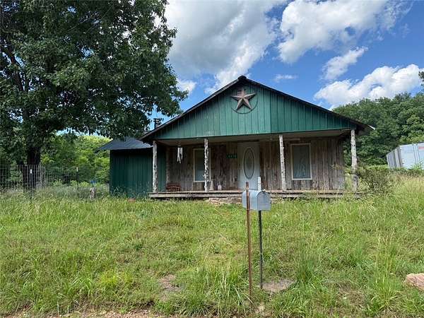 7 Acres of Land with Home for Sale in Huntsville, Arkansas