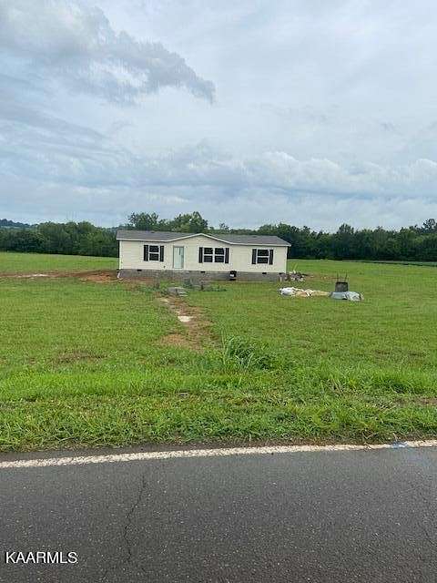 5.72 Acres of Land with Home for Sale in Niota, Tennessee