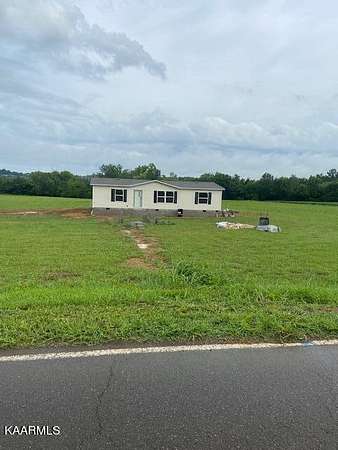 5.72 Acres of Land with Home for Sale in Niota, Tennessee