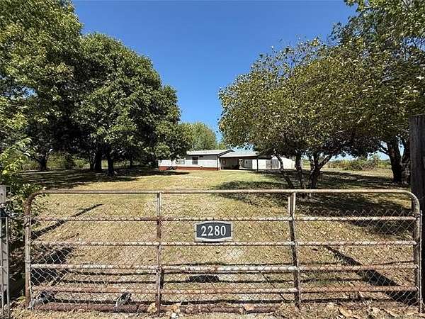 3 Acres of Land with Home for Sale in Mounds, Oklahoma
