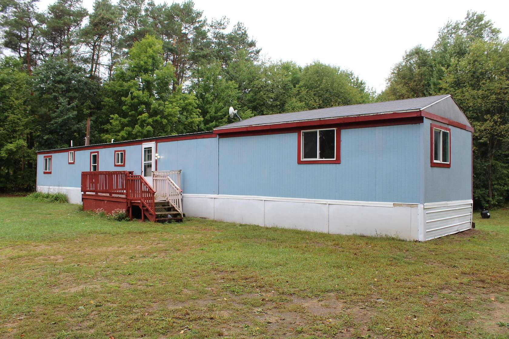 1.5 Acres of Land with Home for Sale in Morley, Michigan