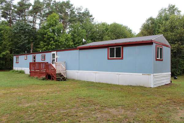 1.5 Acres of Land with Home for Sale in Morley, Michigan
