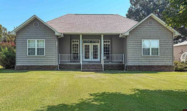 3.55 Acres of Land with Home for Sale in Flippin, Arkansas