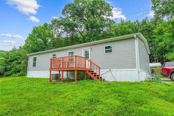 5.28 Acres of Land with Home for Sale in Omaha, Arkansas