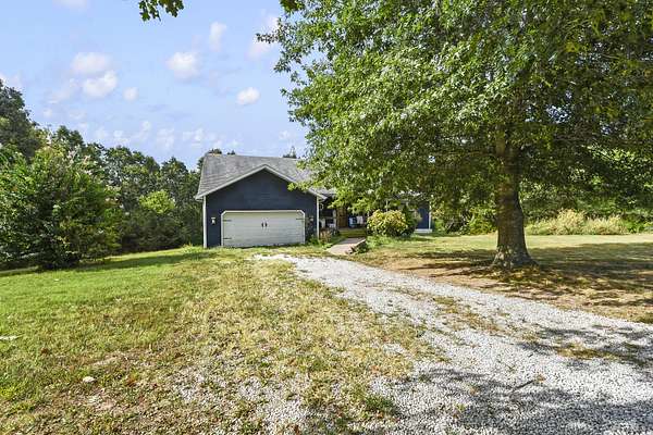 28.3 Acres of Land with Home for Sale in Billings, Missouri