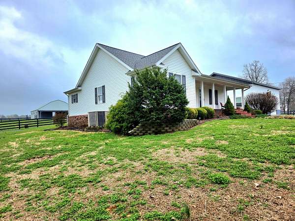 9.5 Acres of Land with Home for Sale in Murray, Kentucky