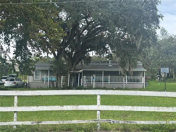 4.8 Acres of Land with Home for Sale in Spring Hill, Florida
